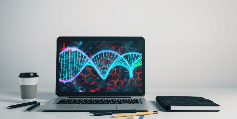 Laptop with digital rendering of DNA on the screen