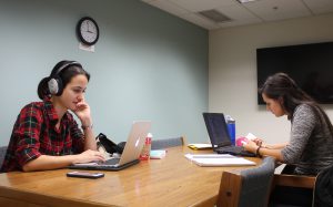 Two students in group study room