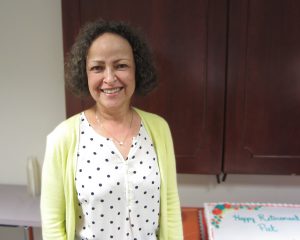 Pat Weiss by retirement cake