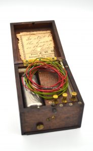 Battery in a case with wires