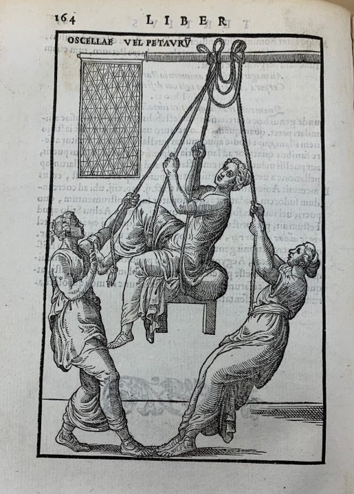 A page of a book featuring an engraving-style illustration depicting three women in togas. Two of the women are standing and pulling on ropes that are hoisting a seat on which the third woman is sitting.